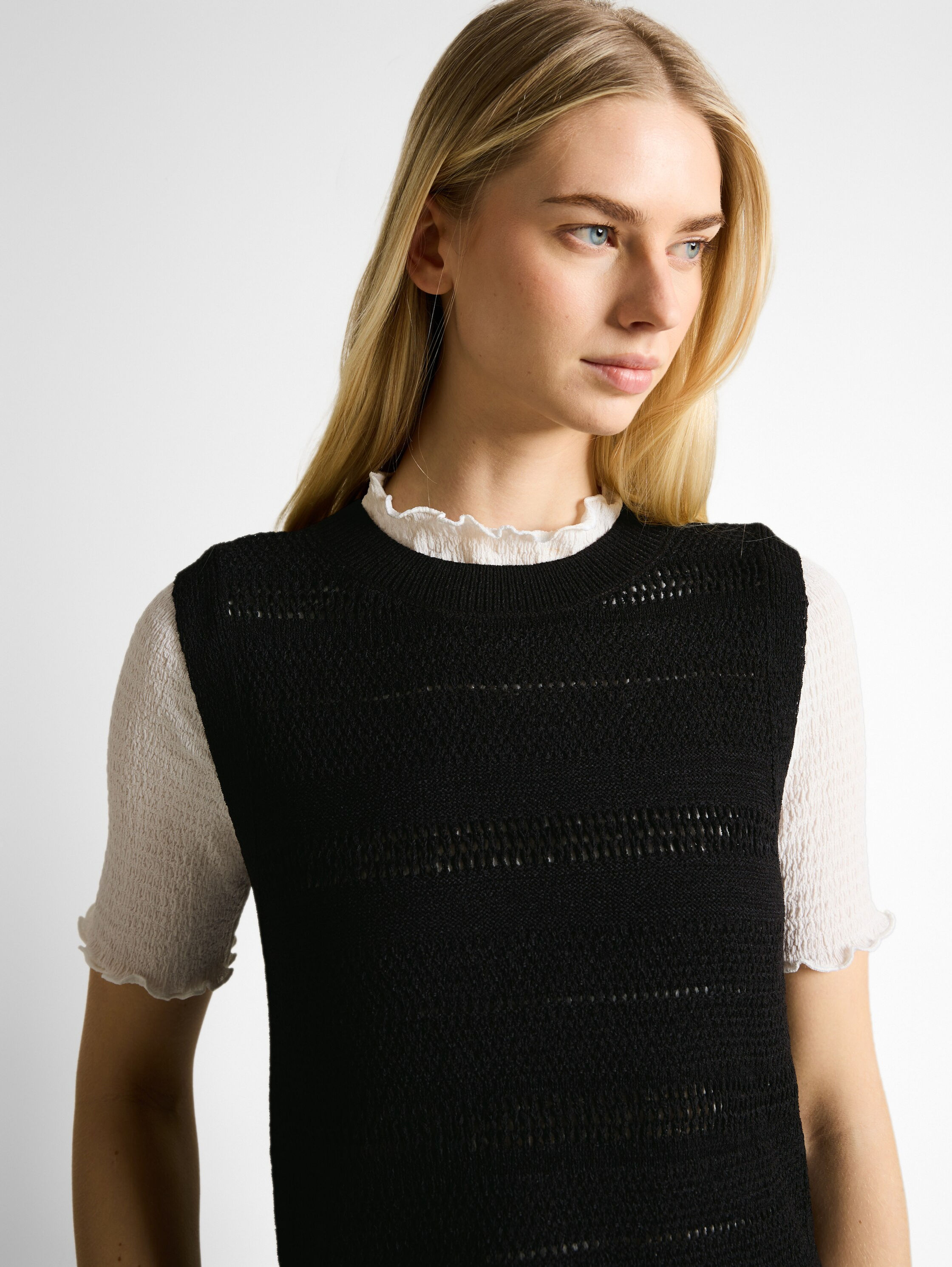 Knit open structure vest