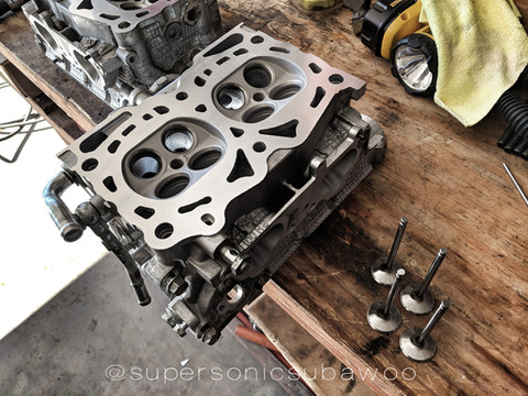 The machinist I hired built enormous engines for enormous applications, so his valve seat and guide machine was "too large" for a precision job on my heads. I thus took to cutting the seats myself. (Luckily, the guides still measured true.)