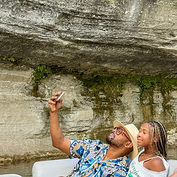Guests taking a selfie during a private Beaver Lake cruise