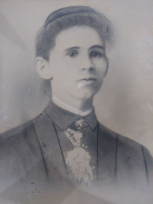 A younger woman posing