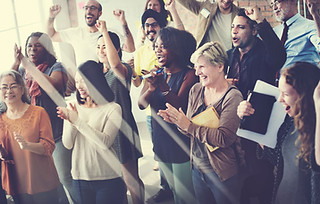 Diverse Group Cheering