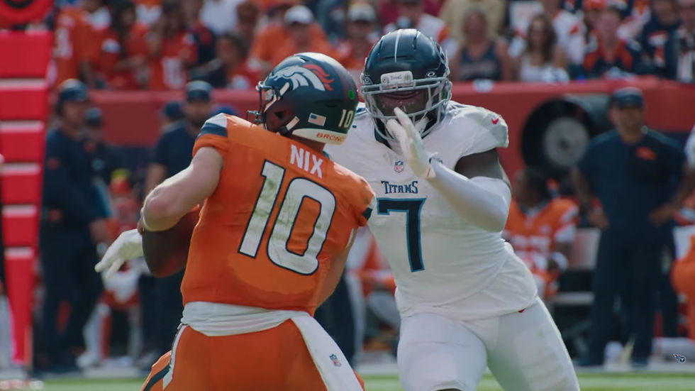Bo Nix in Denver Broncos No. 10 uniform facing Tennessee pressure during the September 13, 2025 game, cropped to 16:9.