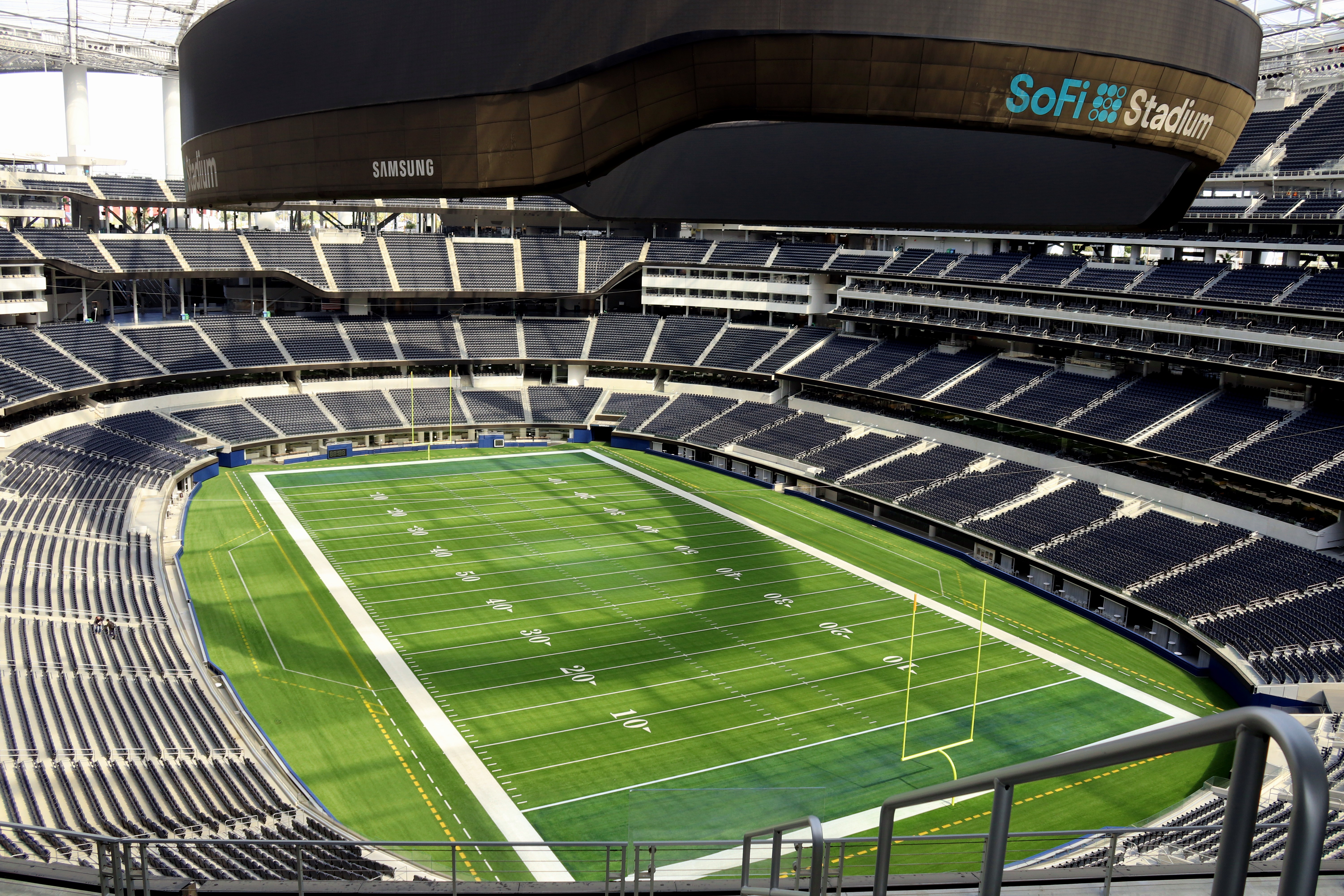 Daytime exterior view of SoFi Stadium in Inglewood, home of the Los Angeles Chargers.