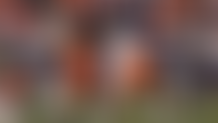 Peter Skoronski, Tennessee Titans No. 77, lines up at right guard during a 2025 game in the 16:9 cover for his $100 million contract extension.