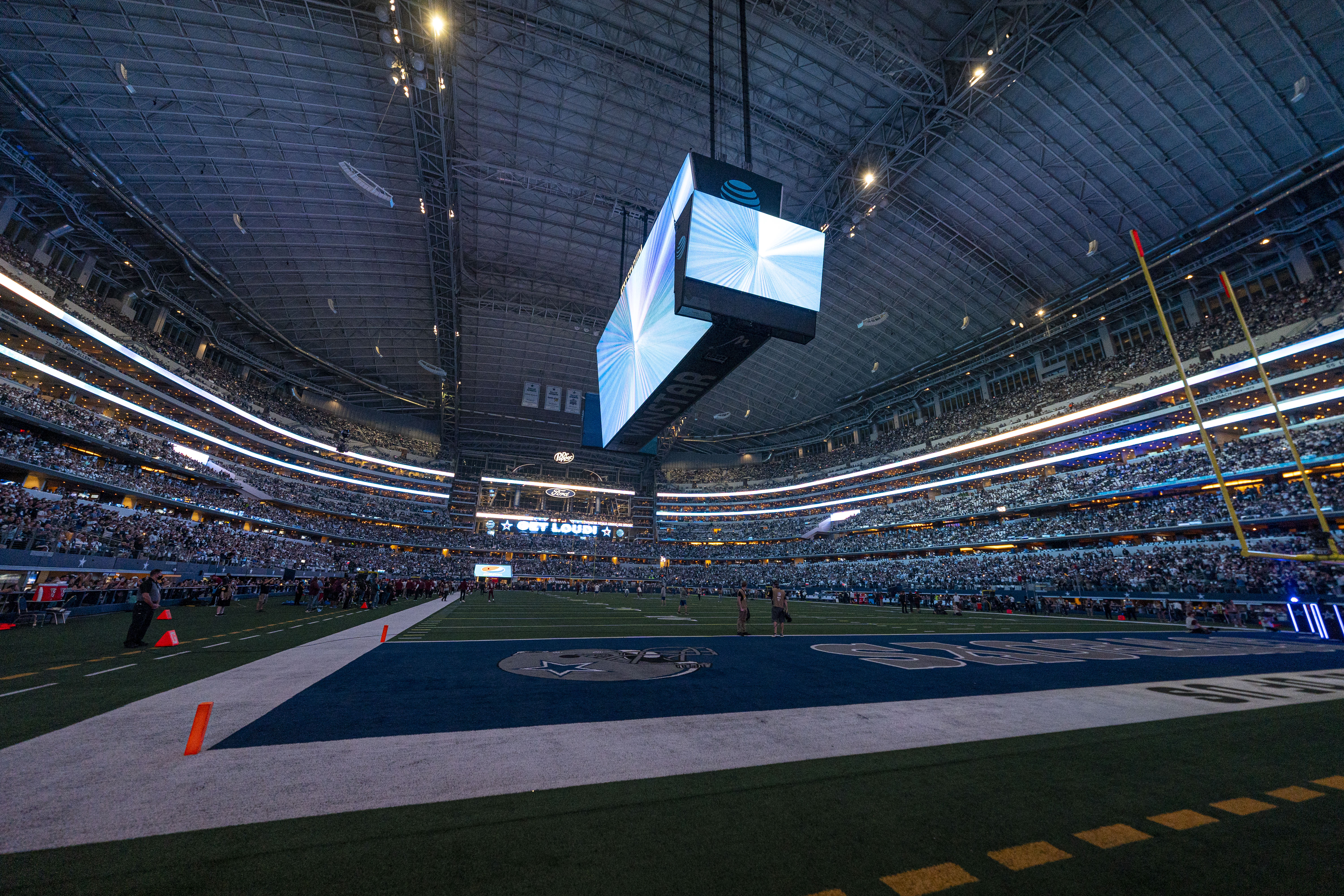Washington and Dallas players line up during a previous rivalry game at AT&T Stadium