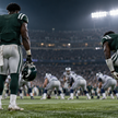 Two anonymous Philadelphia-style edge defenders prepare for a night game against a Dallas-style offense