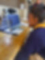 Merlin HD Mini Magnifier being used by a child for schoolwork