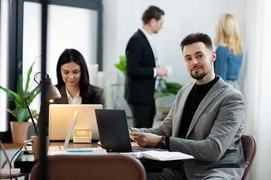 medium-shot-people-working-desk.jpg