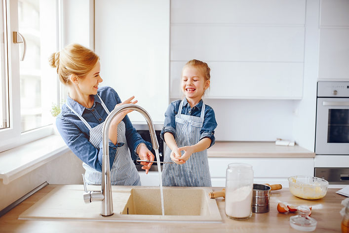 beautiful-mother-blue-shirt-apron-is-preparing-dinner-home-kitchen.jpg