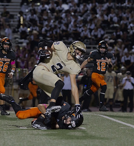 football player tackling another player in a match_edited_edited.jpg