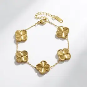 Pulseira aço titânio trevo dourada