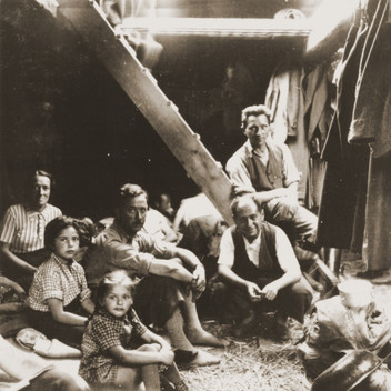 Jewish refugees from the Kladovo transport sit below deck during their journey from Kladovo to Sabac.jpeg