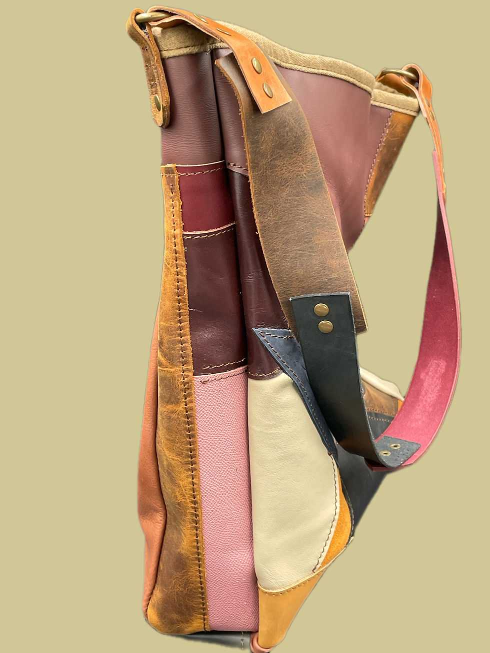 Side view of Handmade landscape tote bag made of leather collage pieces