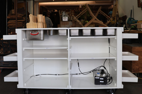 Lots of customizable storage, plus a neatly tucked away LED light system to light up the company logo.