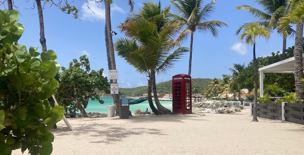 Dickenson Bay with iconic red English phone box