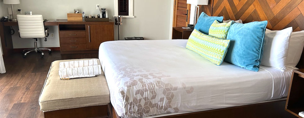 Bedroom area in the waterfront suite at Hammock Cove Antigua