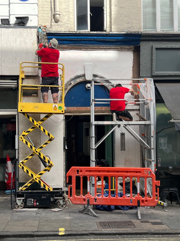 Soho Maintenance Ltd workers on lifts maintaining building