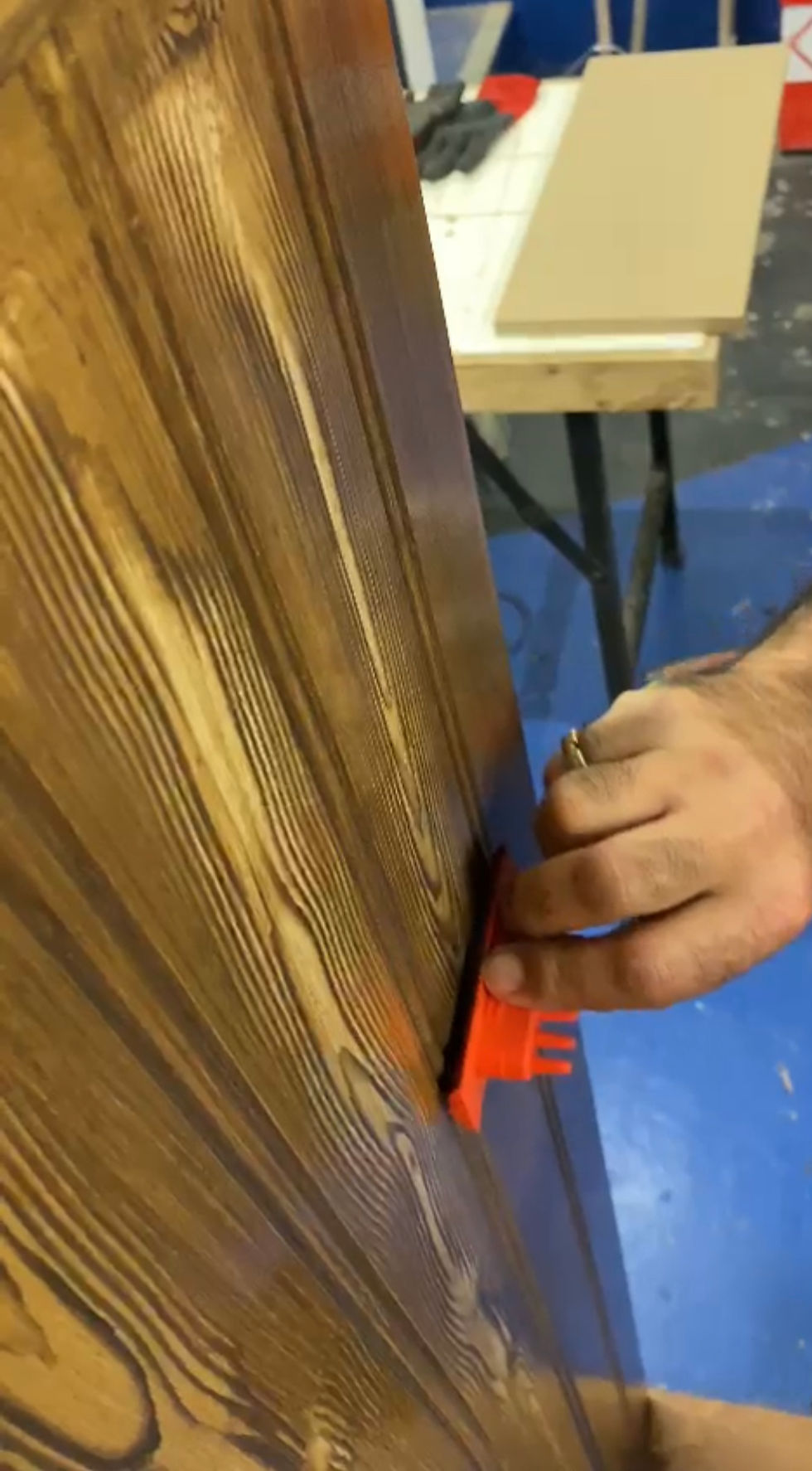 Soho Maintenance Ltd worker using a tool on wood