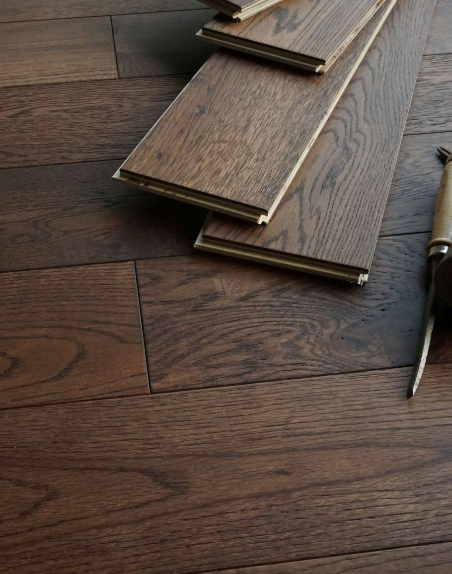 Dark wooden flooring planks for installation