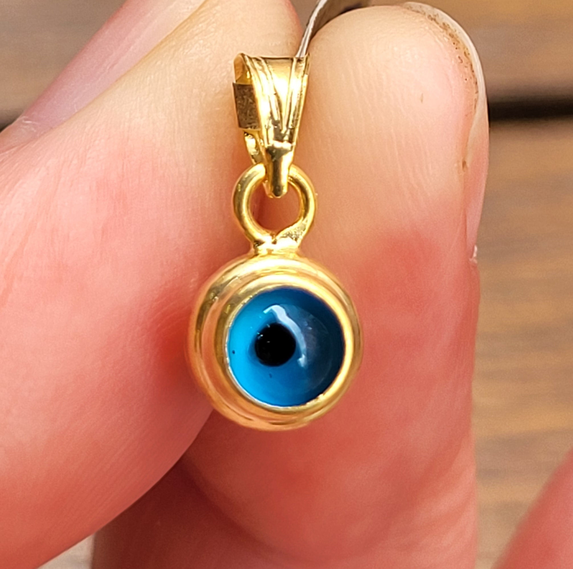 Small evil eye pendants