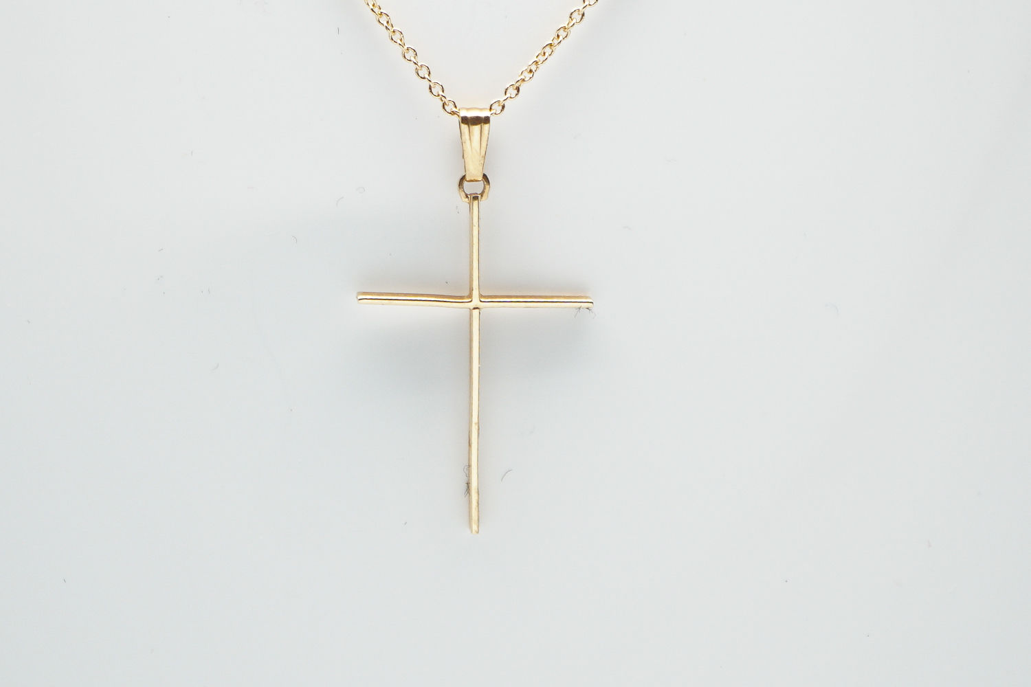 14 karat yellow gold cross pendant