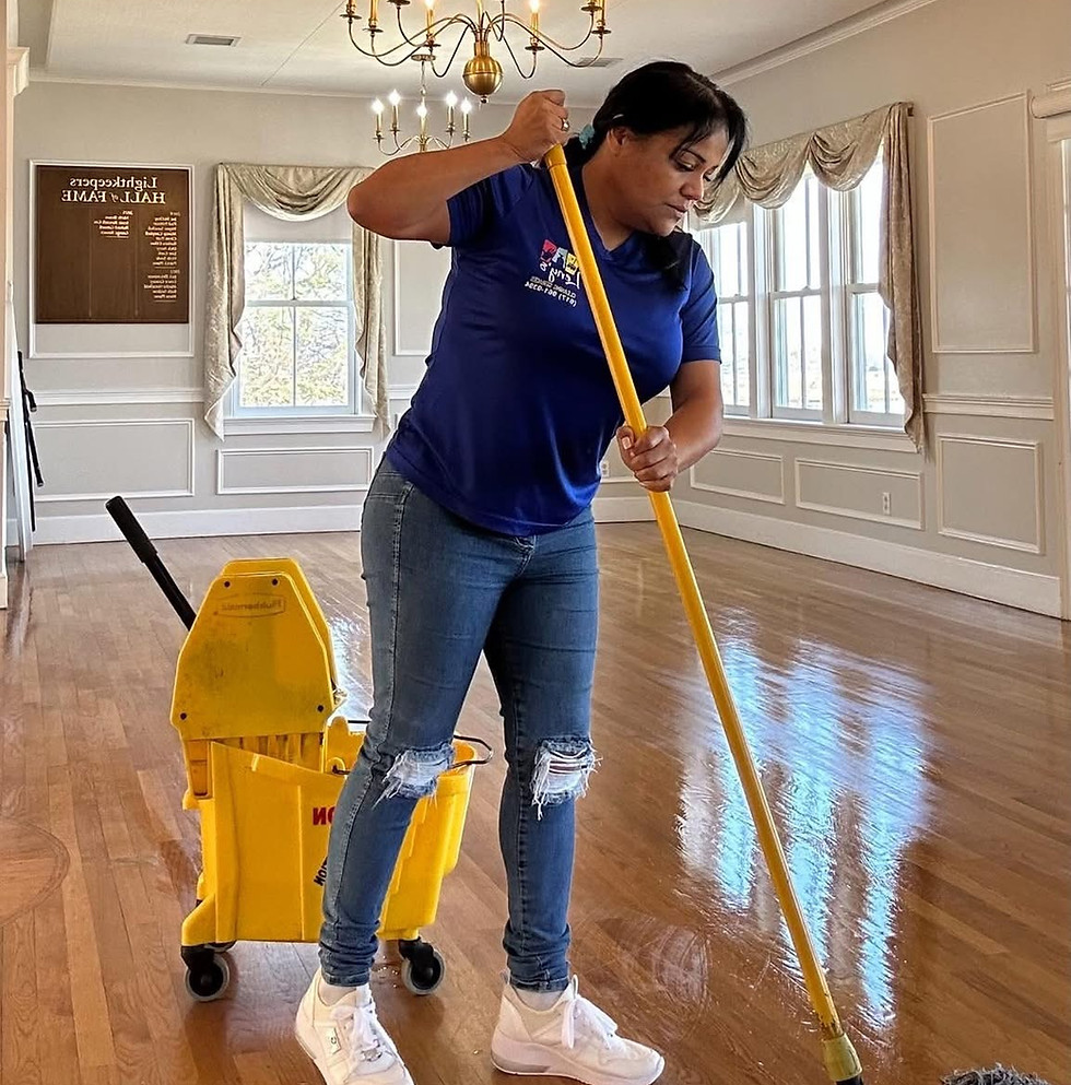 Leny's Cleaning Services mopping floor. Call 617-961-9394.