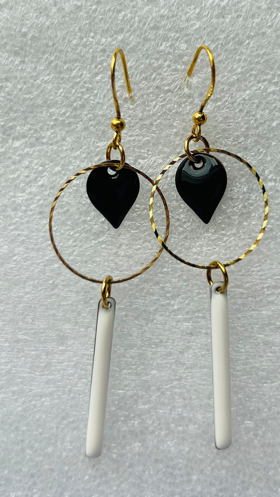 Boucles d'oreilles longue ronde biseautée