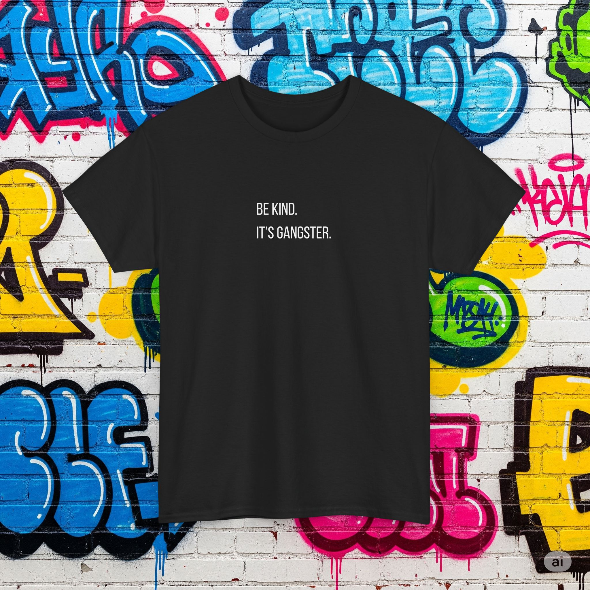 A black t-shirt with white text in the center that reads: BE KIND. ITS GANGSTER.