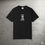 Thumbnail: A black t-shirt with a graphic of a cartoon plague doctor with a beak mask with text that reads plague survivor