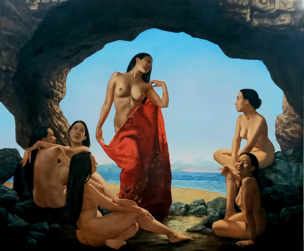 Nude women hanging out by the sea