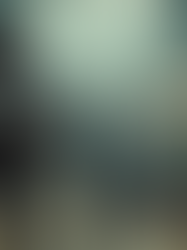 Eye-level view of a filmmaker setting up a camera on an indie film set