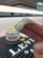 Thumbnail: Low hold low shine styling pomade on fingers