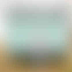 A man and a woman stand in front of a closed market stand