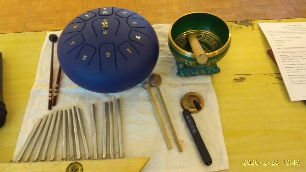 Blue steel tongue drum, green singing bowl, and kalimba keys