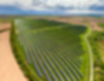 aerial-view-big-sustainable-electric-power-plant-with-many-rows-solar-photovoltaic-panels-