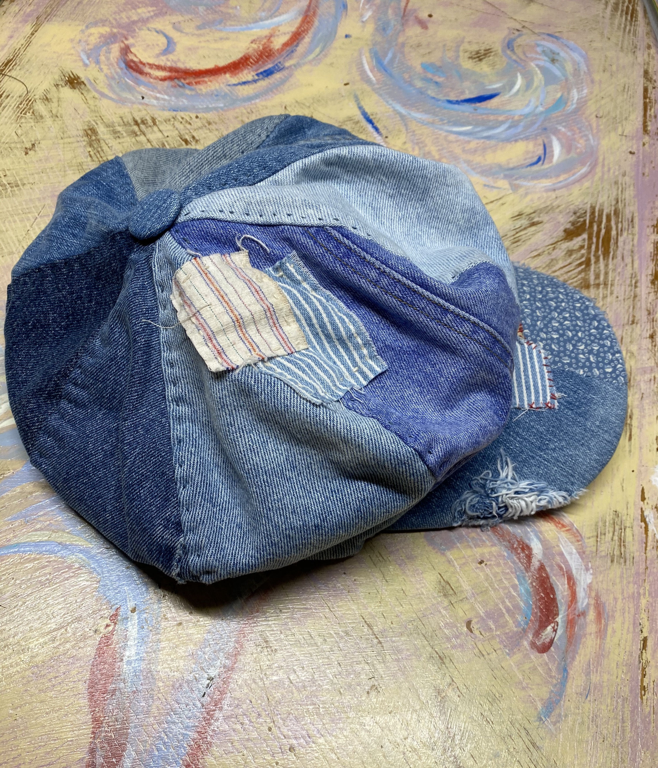 Hand-constructed cap by Fly Art Atelier, eight-panel design, natural materials, one-of-a-kind artisan cap