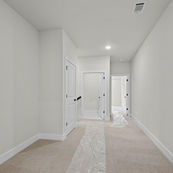 Upstairs landing space in Rogers AR townhome ideal for reading nook or lounge area