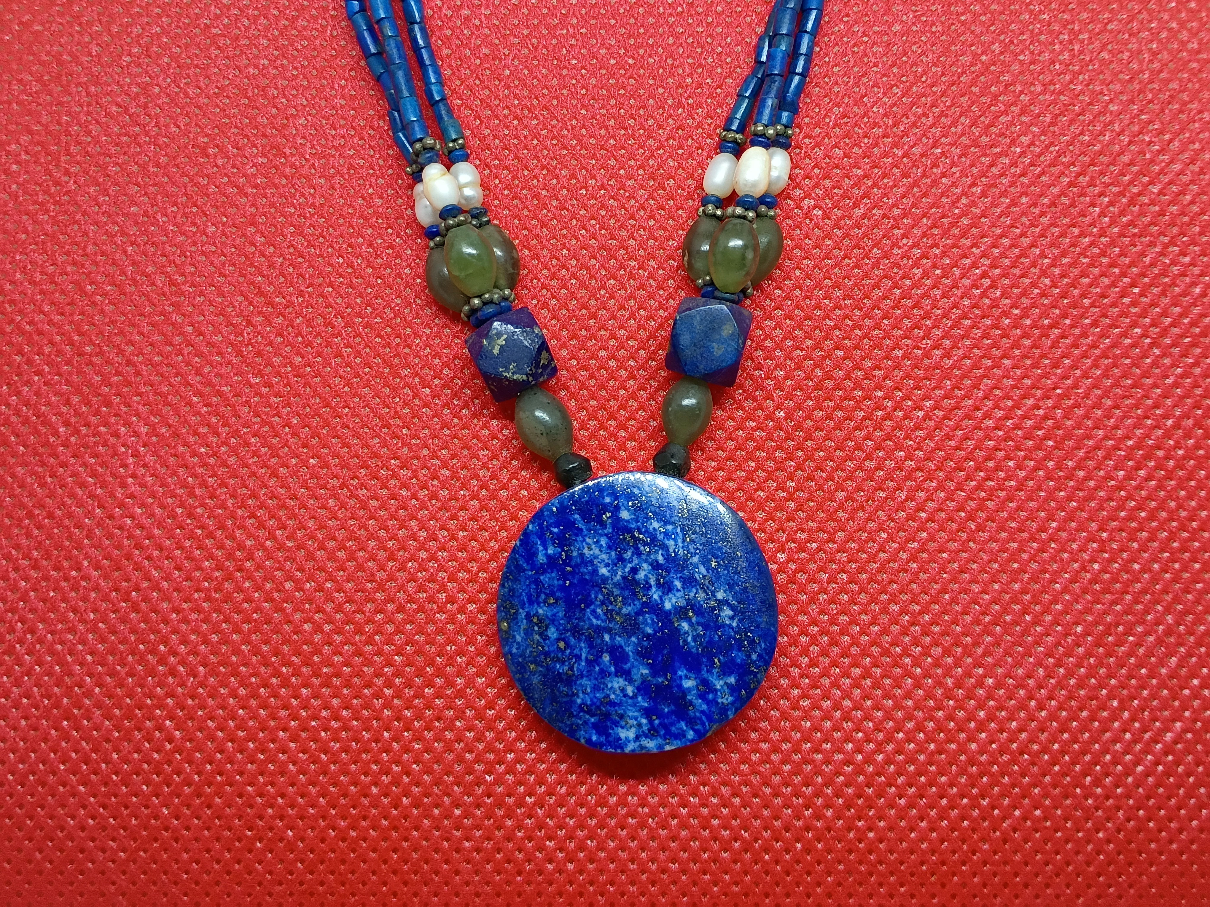 Approx. 20" necklace-round lapis lazuli pendant with blue and green accents