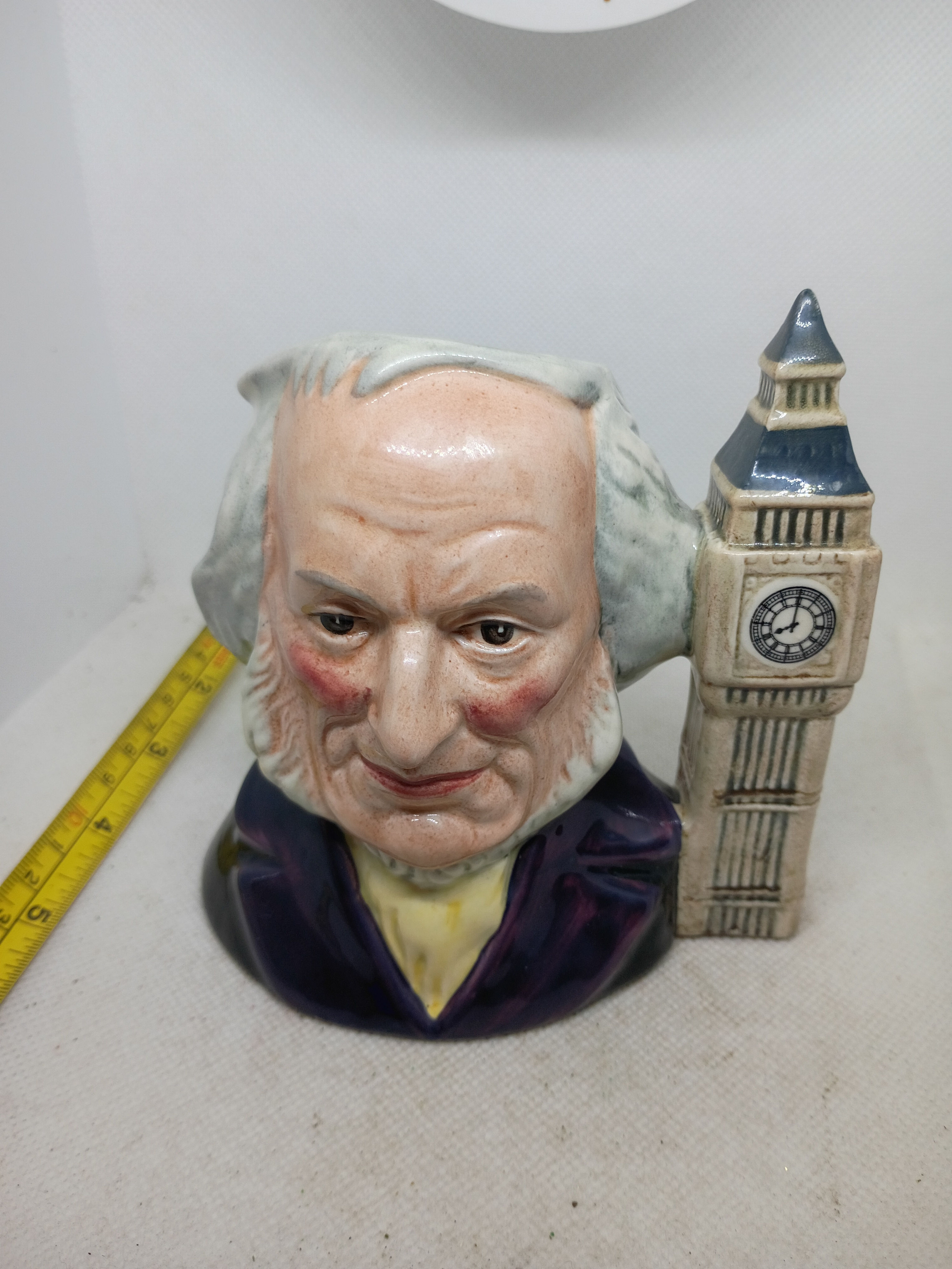 Vintage Royal Doulton character/toby mug depicting John Doulton w/Big Ben handle