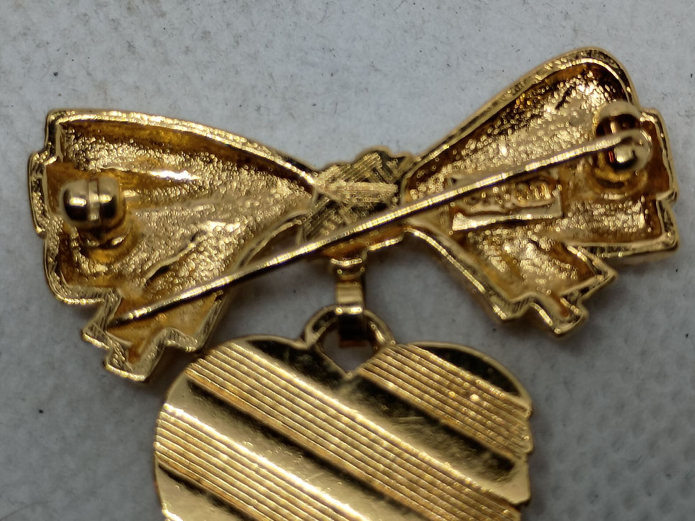 Thumbnail: Approx. 1.5" 1980s vintage Avon gold-tone bow and heart brooch 