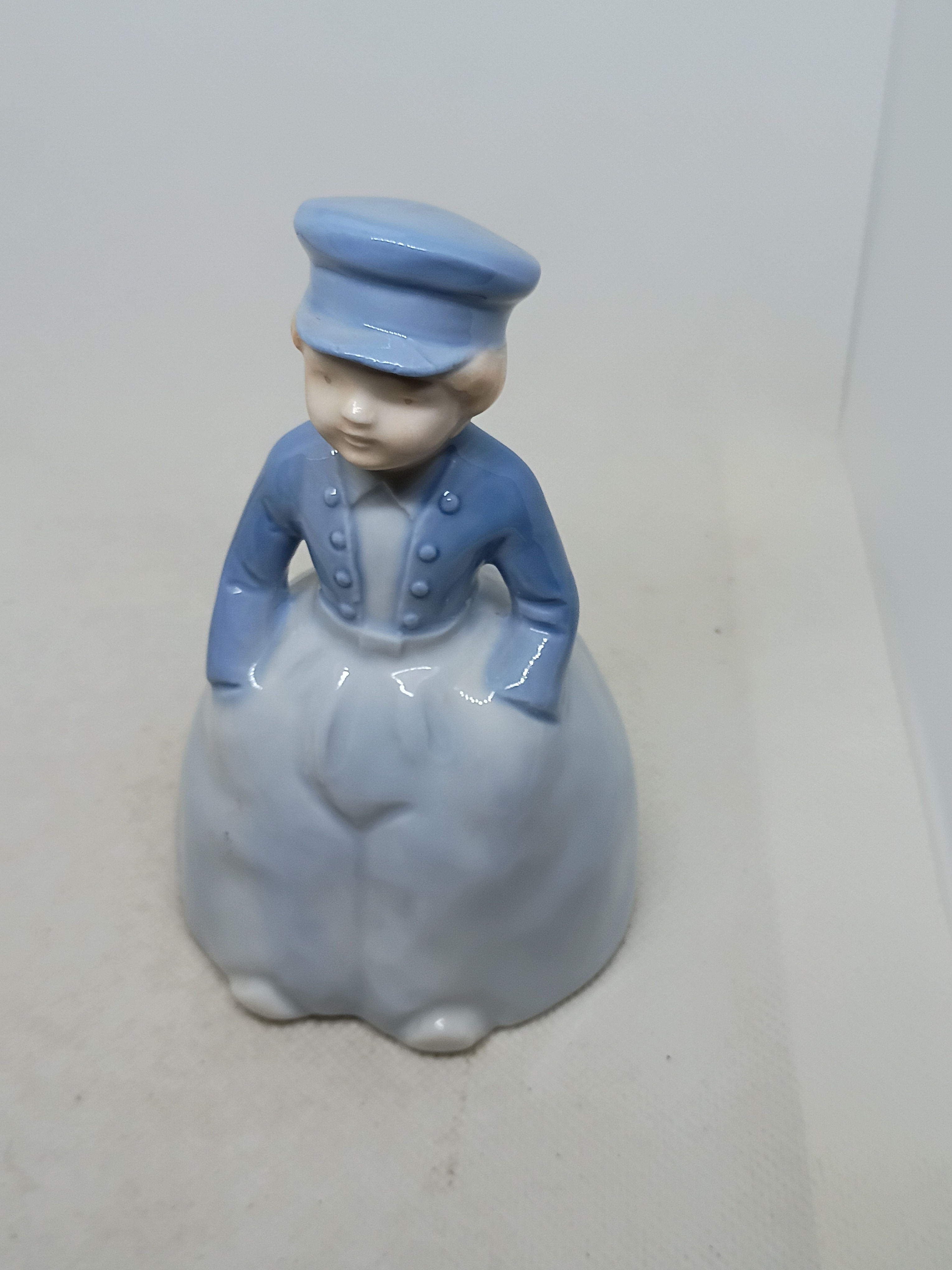 5" Porcelain Bell- This is a vintage porcelain "Little Dutch Boy" bell 