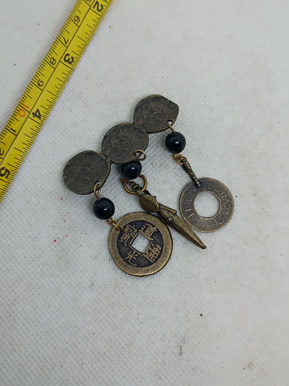 Thumbnail: Vintage costume jewelry brooch  dangling charms w/ black bead accents and coins