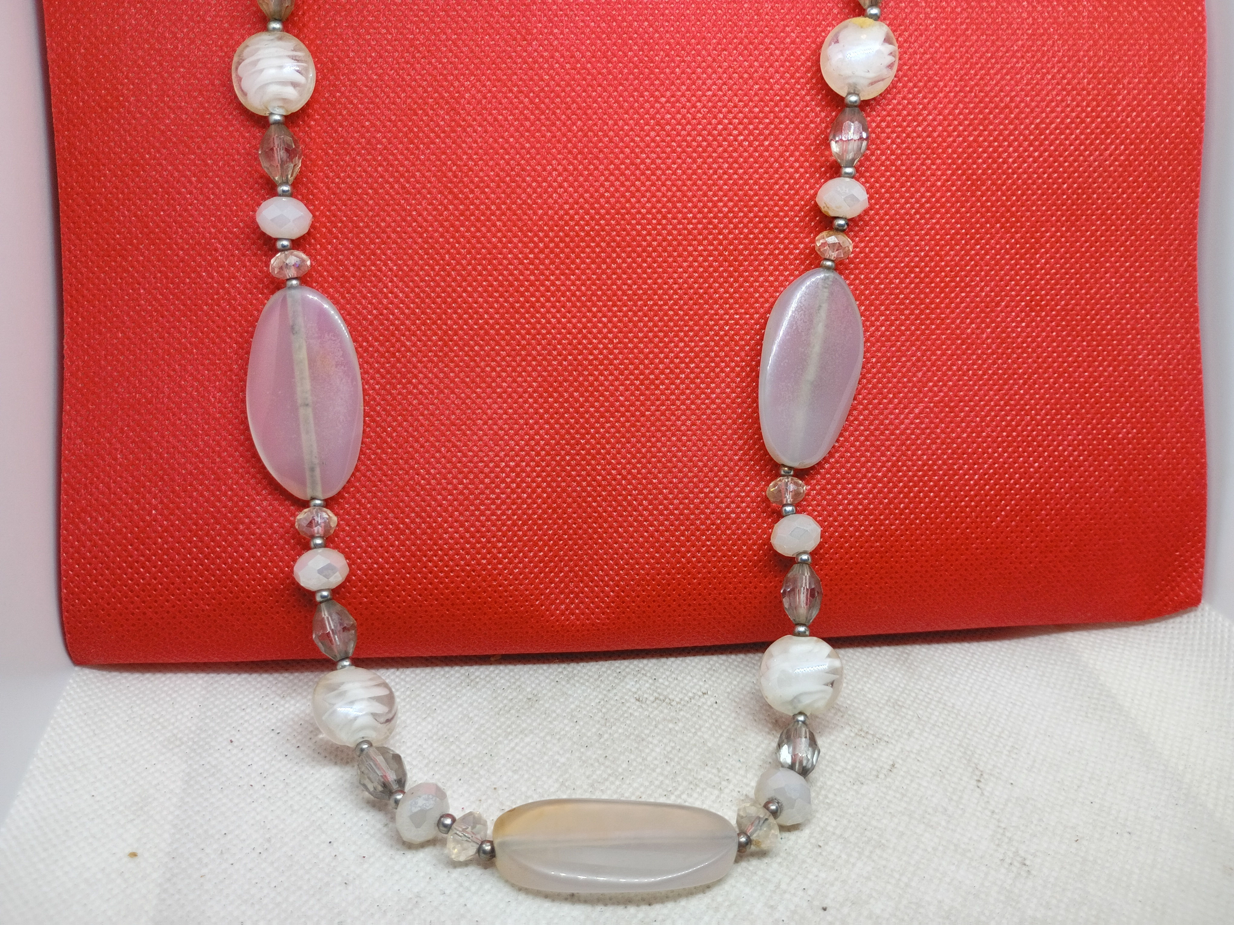 Approx 32" A vintage multi-gemstone beaded necklace with patterned stone beads