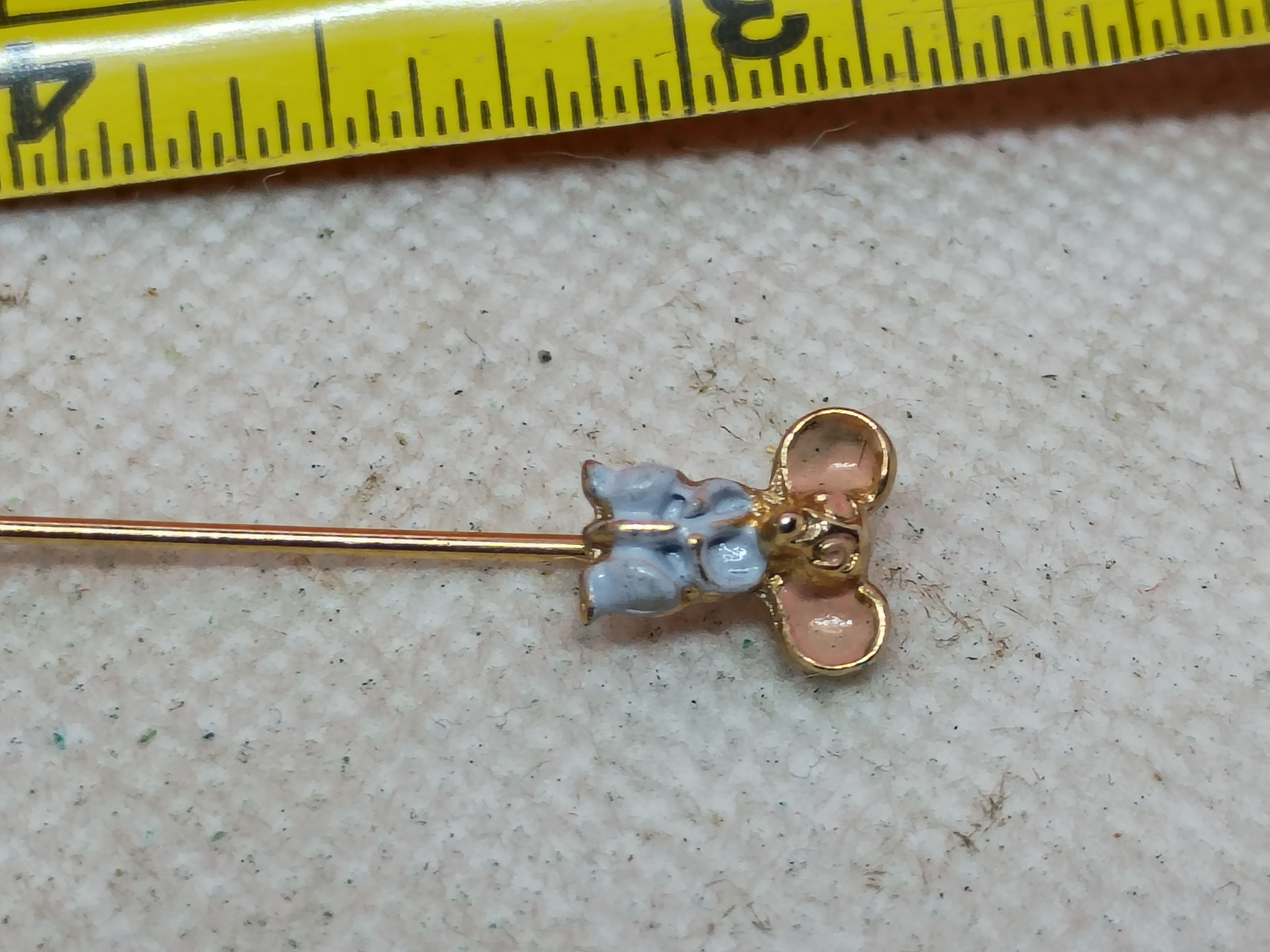 1.75" Gold-tone lapel stick pin featuring a mouse motif-light blue and pink