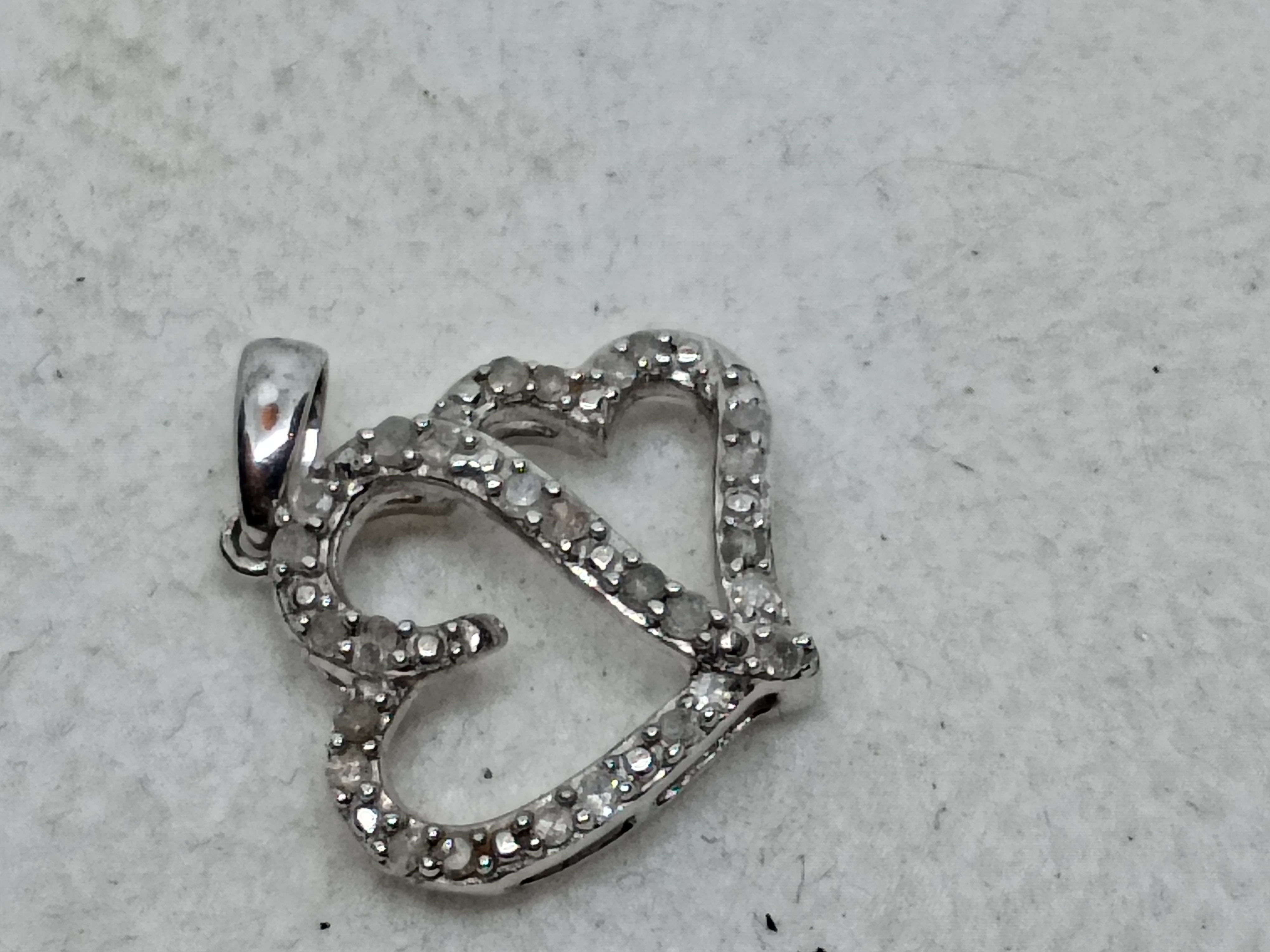 Approx. 1.25" 925 sterling silver double heart diamond pendant 