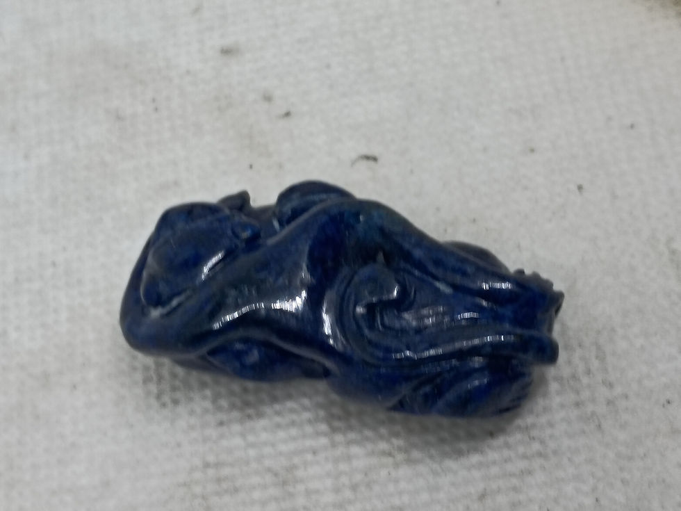 Thumbnail: 2" long - handcrafted figurine carved from a deep blue gemstone, likely lapis 