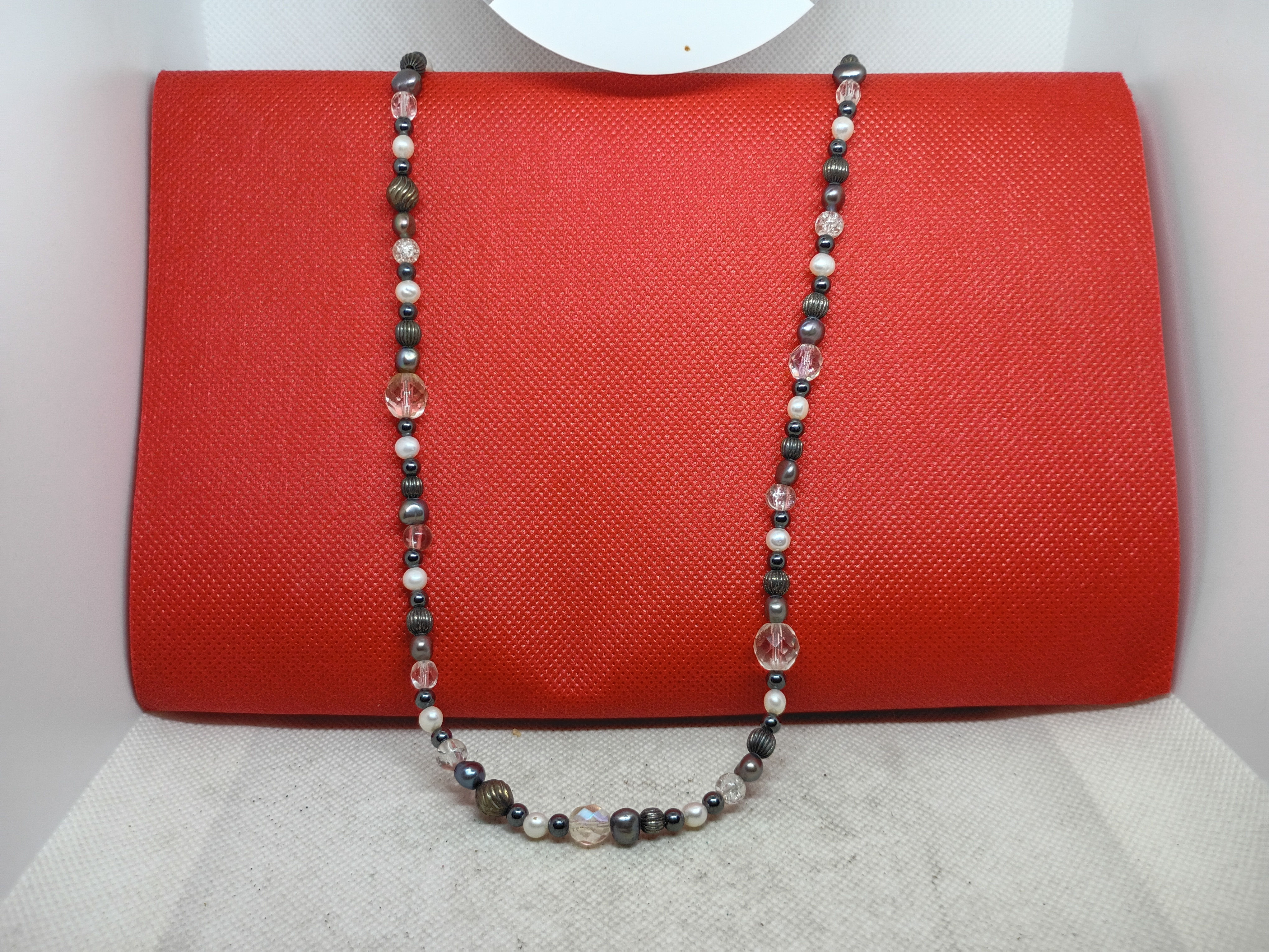 Approx 26" A vintage multi-gemstone beaded necklace with patterned stone beads