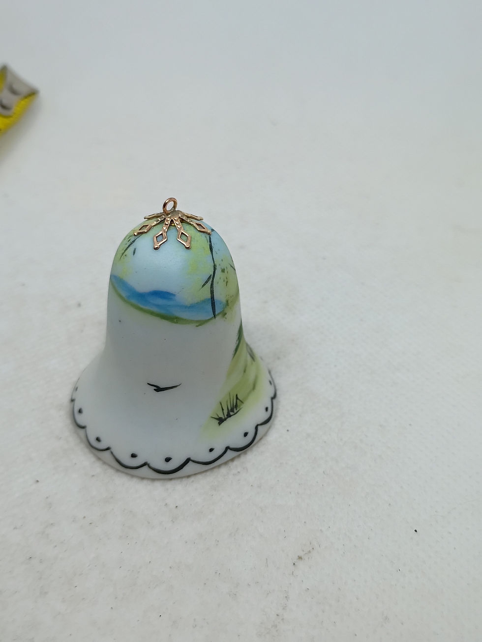 Thumbnail: Approx. 2" tall- porcelain bell - handpainted bell- signed Joel 78