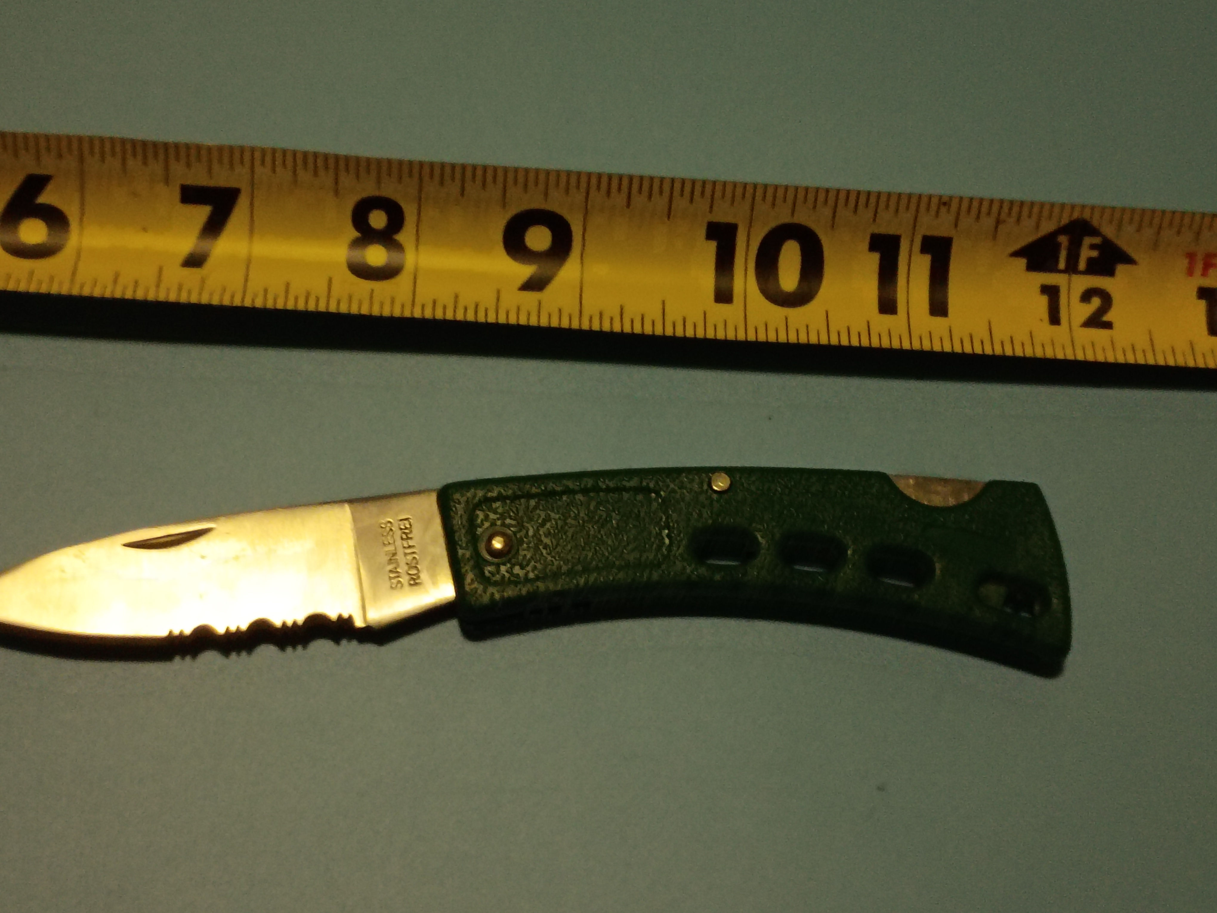Approx. 5" Folding pocket knife-stainless steel blade-textured grip black handle