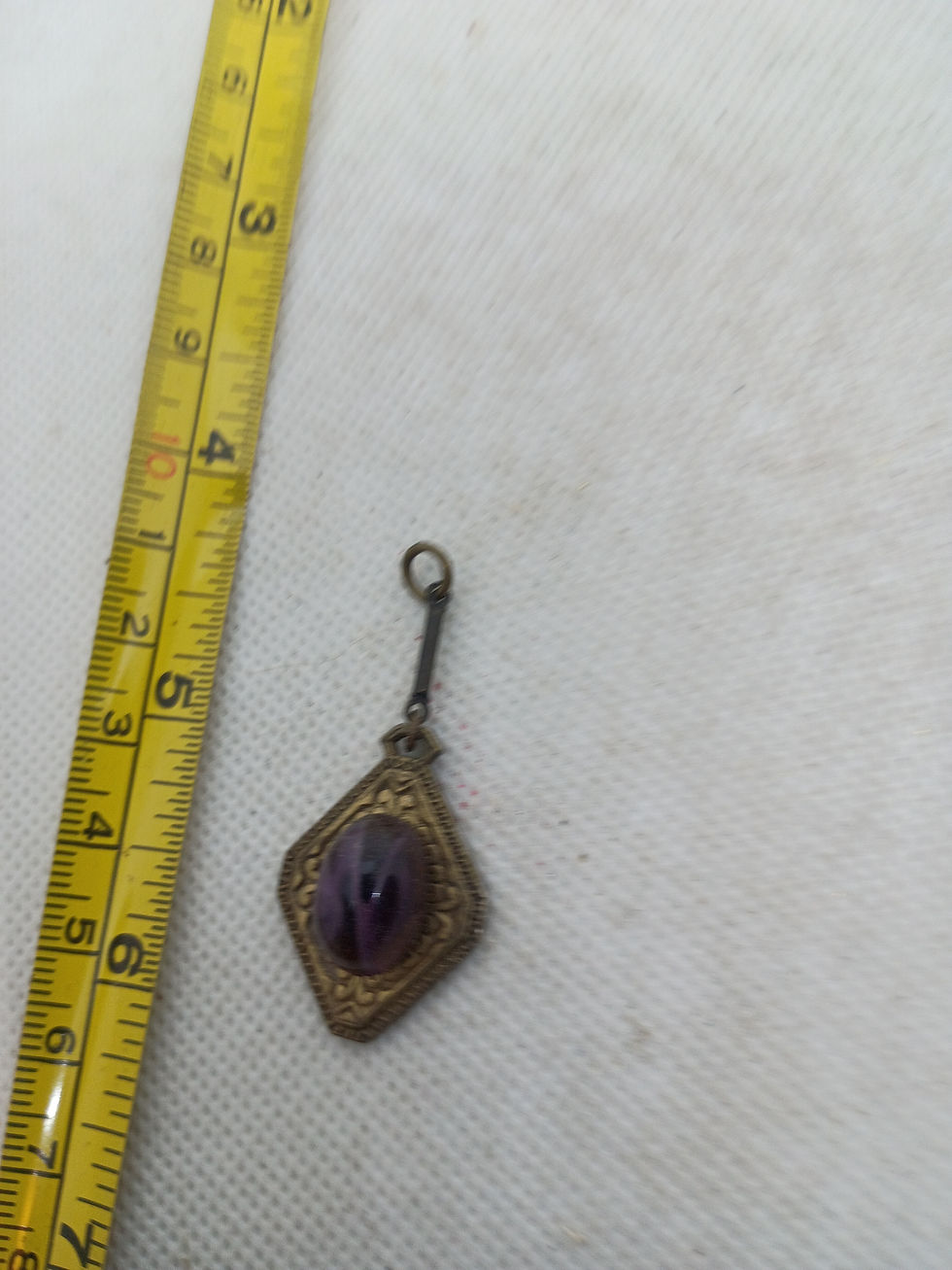 Thumbnail: Approx. 2"Vintage Art Deco or Art Nouveau brass-toned metal pendant purple stone